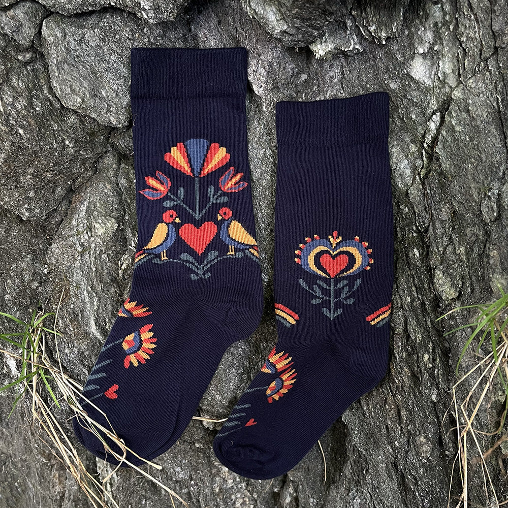 Made in USA Fraktur PA Dutch folk art navy cotton socks with hearts, flowers, and distelfinks by THIS NIGHT