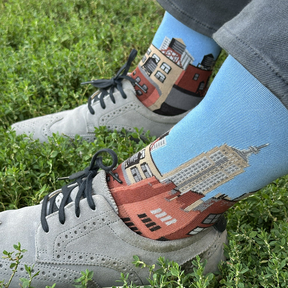 Made in USA men's blue cotton socks with NYC citycape skyline design featuring Empire State Building and water towers by THIS NIGHT