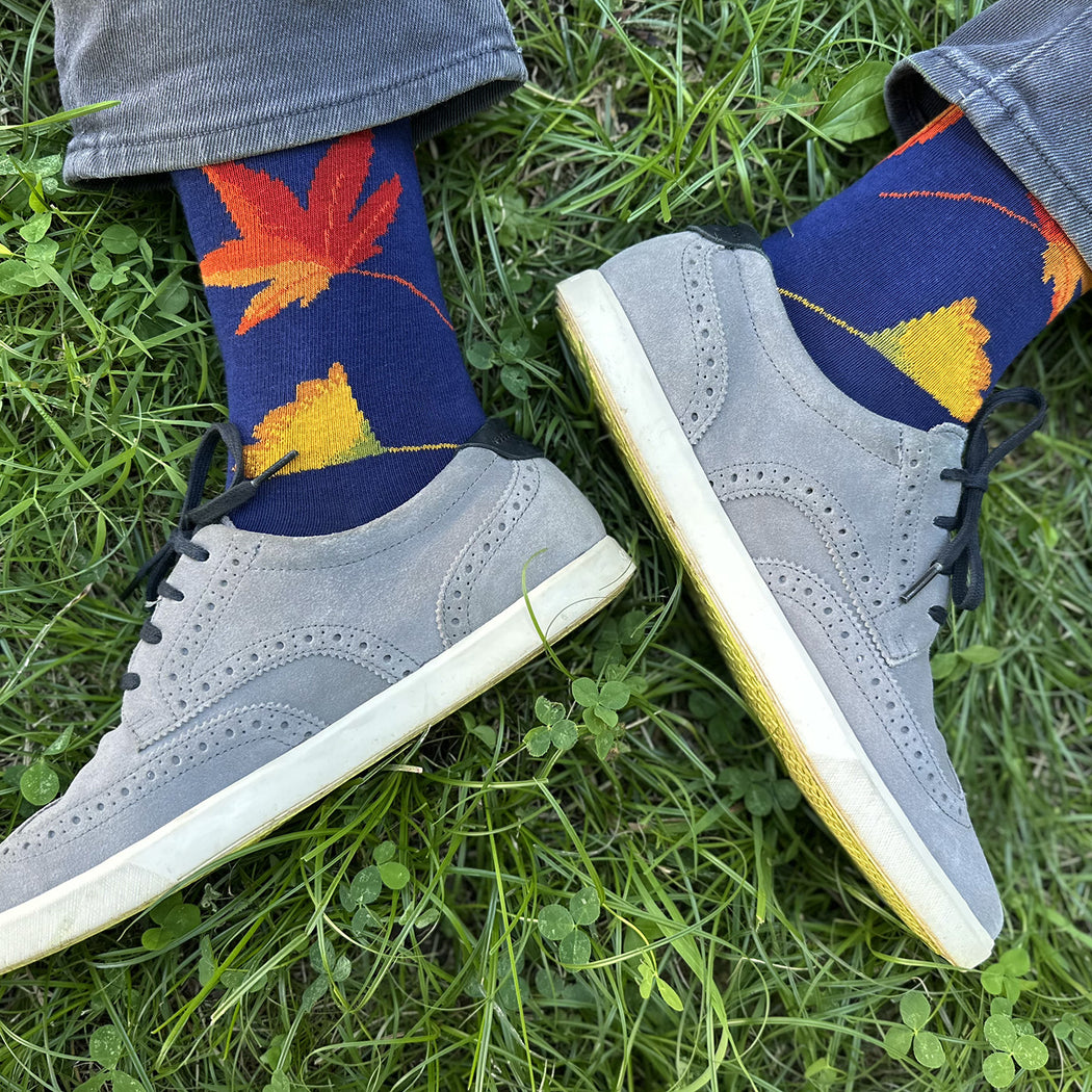 Made in USA men's blue cotton fall foliage socks with red, orange and yellow maple and gingko leaves by THIS NIGHT