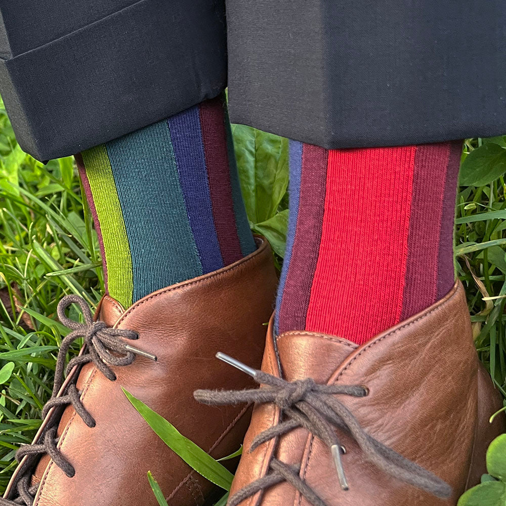  Made in USA women's vertical striped, asymmetrical (mismatched) Christmas holiday socks in burgundy, red, green, and blue by THIS NIGHT