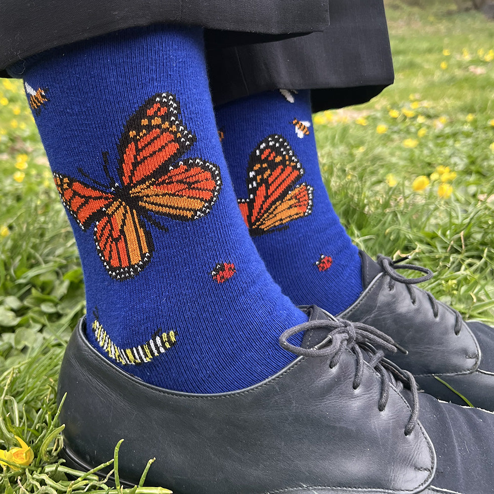 Made in USA women's bright blue cotton socks with friendly bugs--monarch butterflies, a caterpillar, honeybees, a dragonfly, and ladybugs--by THIS NIGHT