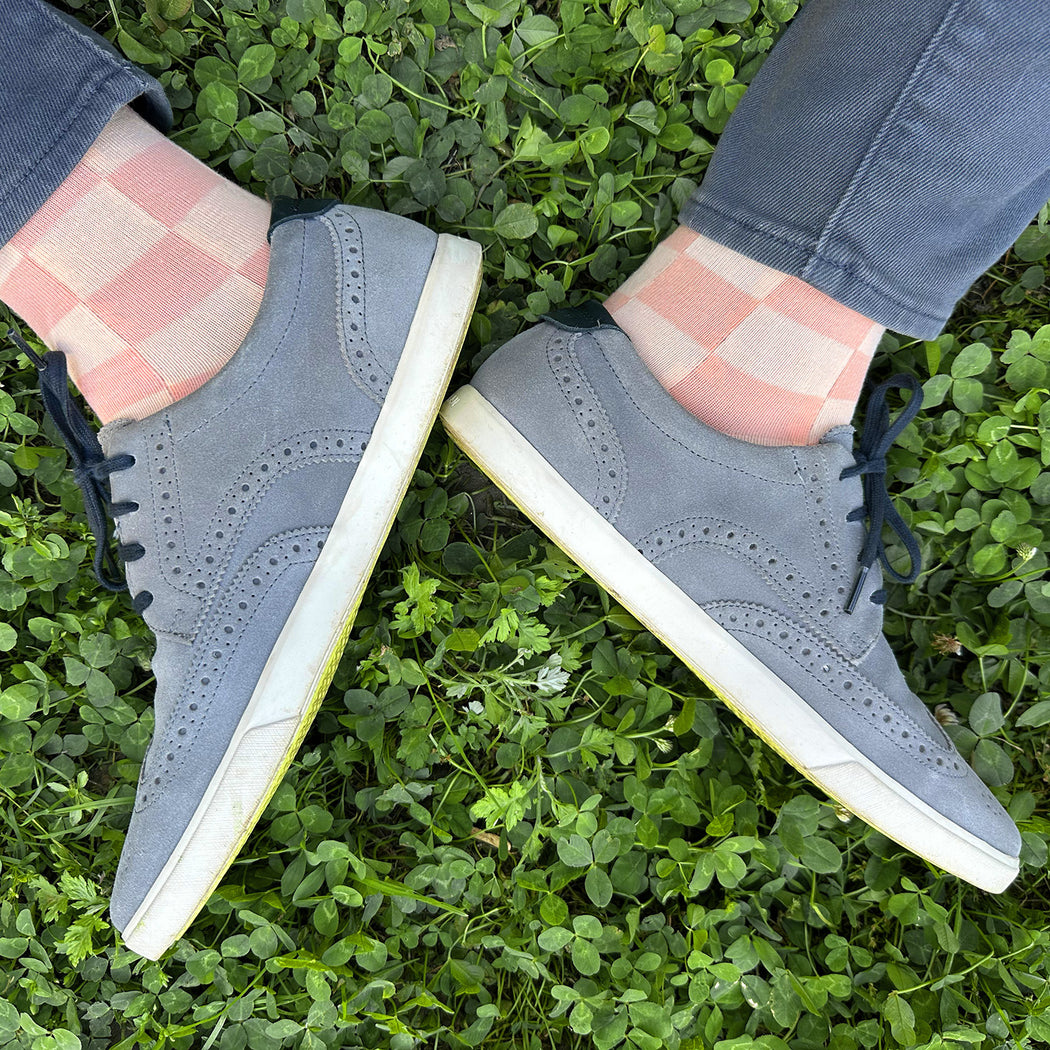 Made in USA men's pastel geometric checkered socks in peach and pale peach