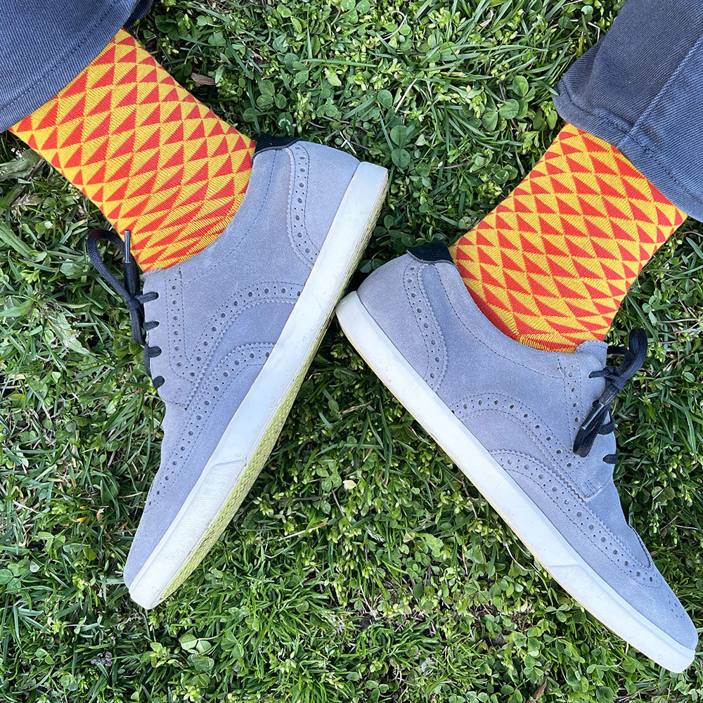 Made in USA men's colorful geometric socks in bright orange and yellow in traditional Japanese pattern, uroko