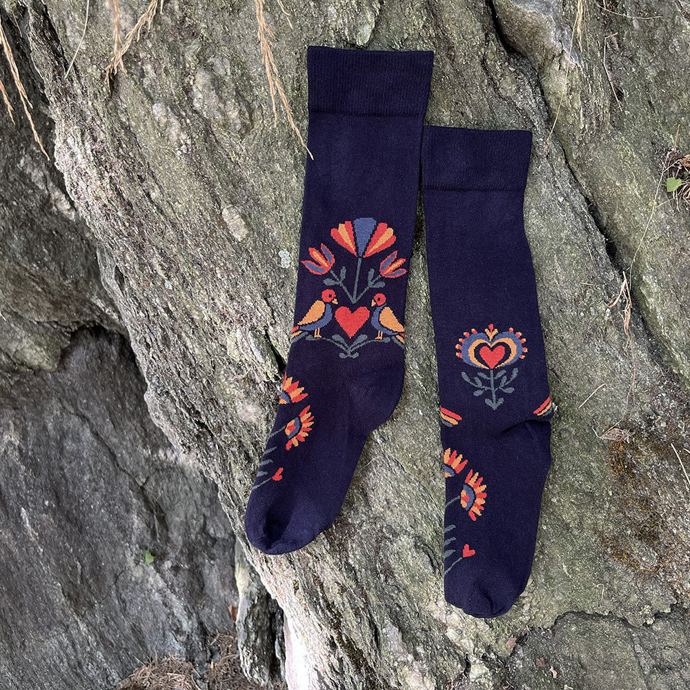 Made in USA men's navy cotton fraktur (PA Dutch folk art) socks featuring a heart, distelfinks, and flowers by THIS NIGHT