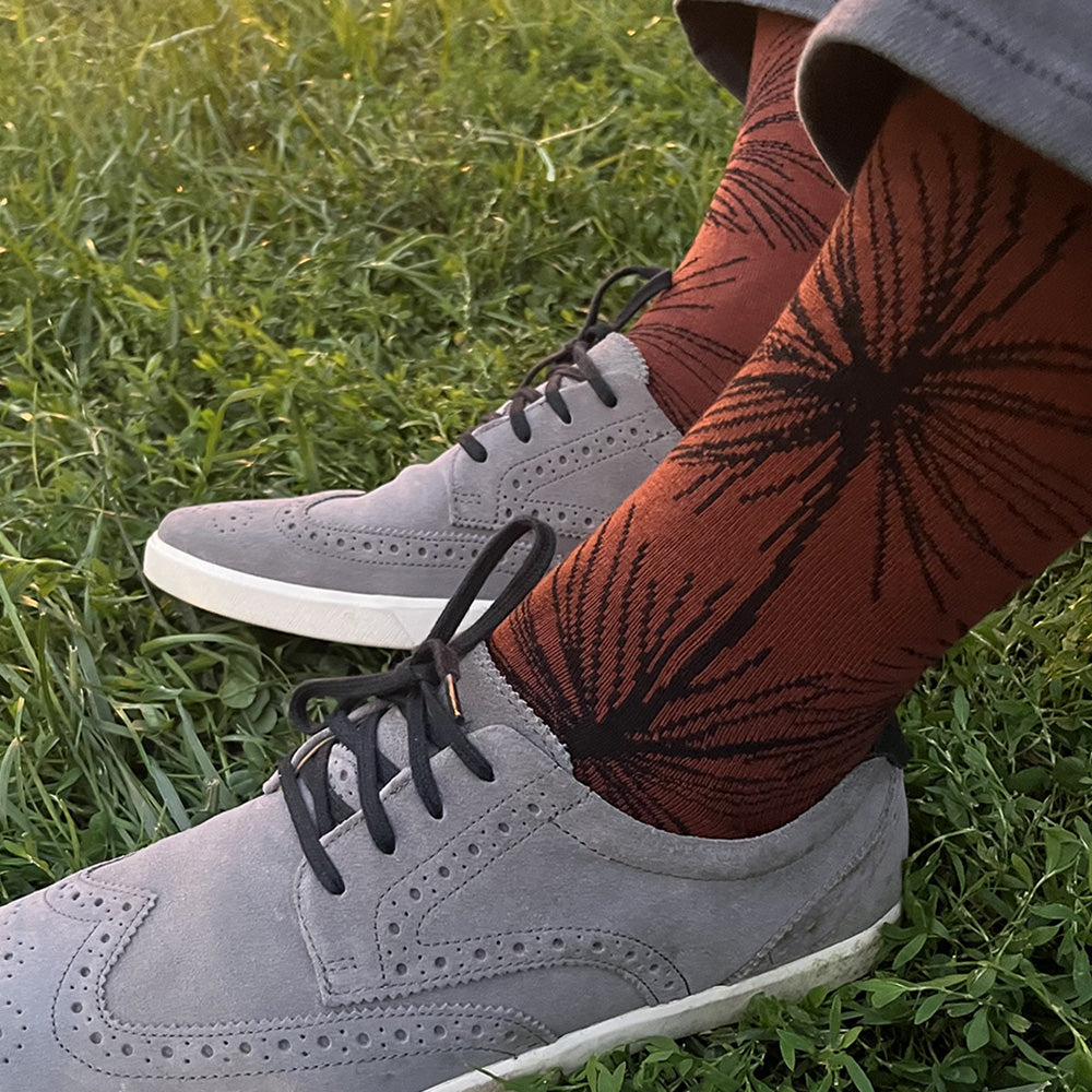 Made in USA men's cotton sock in rust/orange/brown with black pine branches inspired by Japanese ink paintings