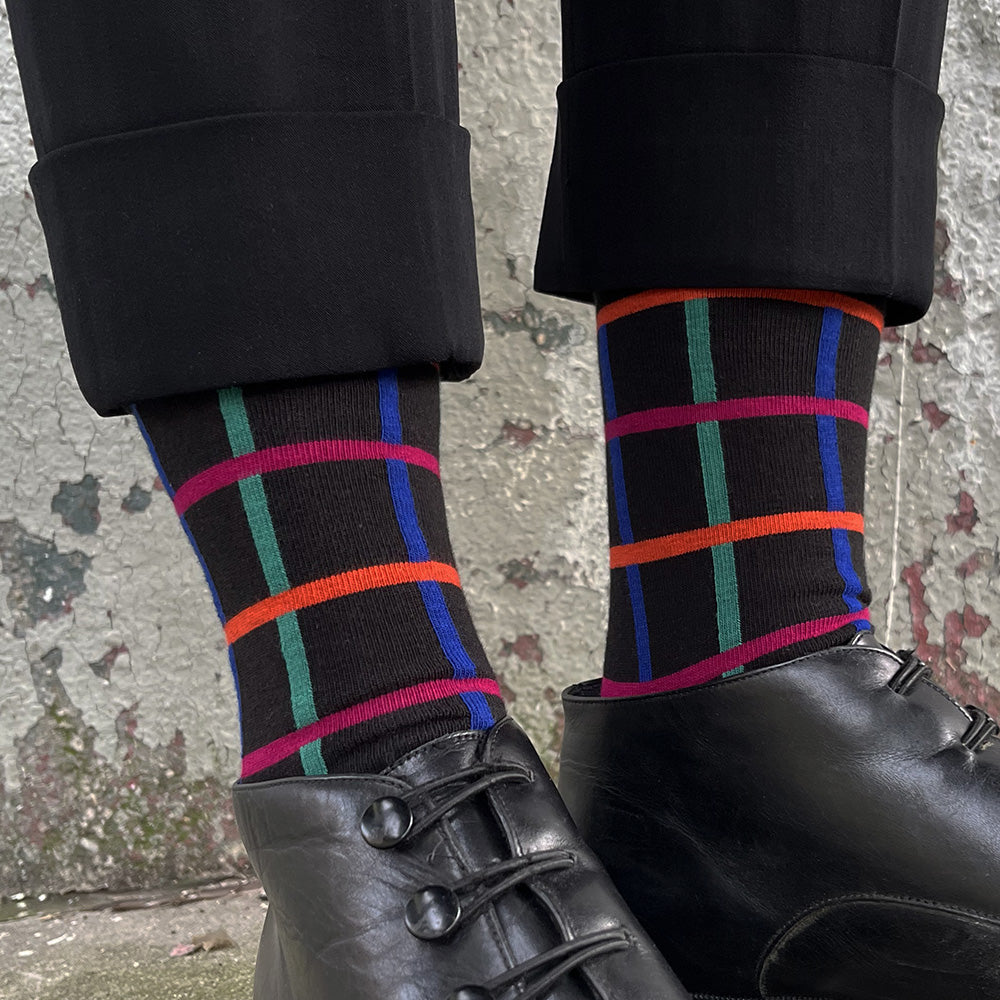 Made in USA women's fun, colorful and geometric black cotton socks with 80s/90s color palette of cobalt blue, magenta, orange, and turquoise green by THIS NIGHT