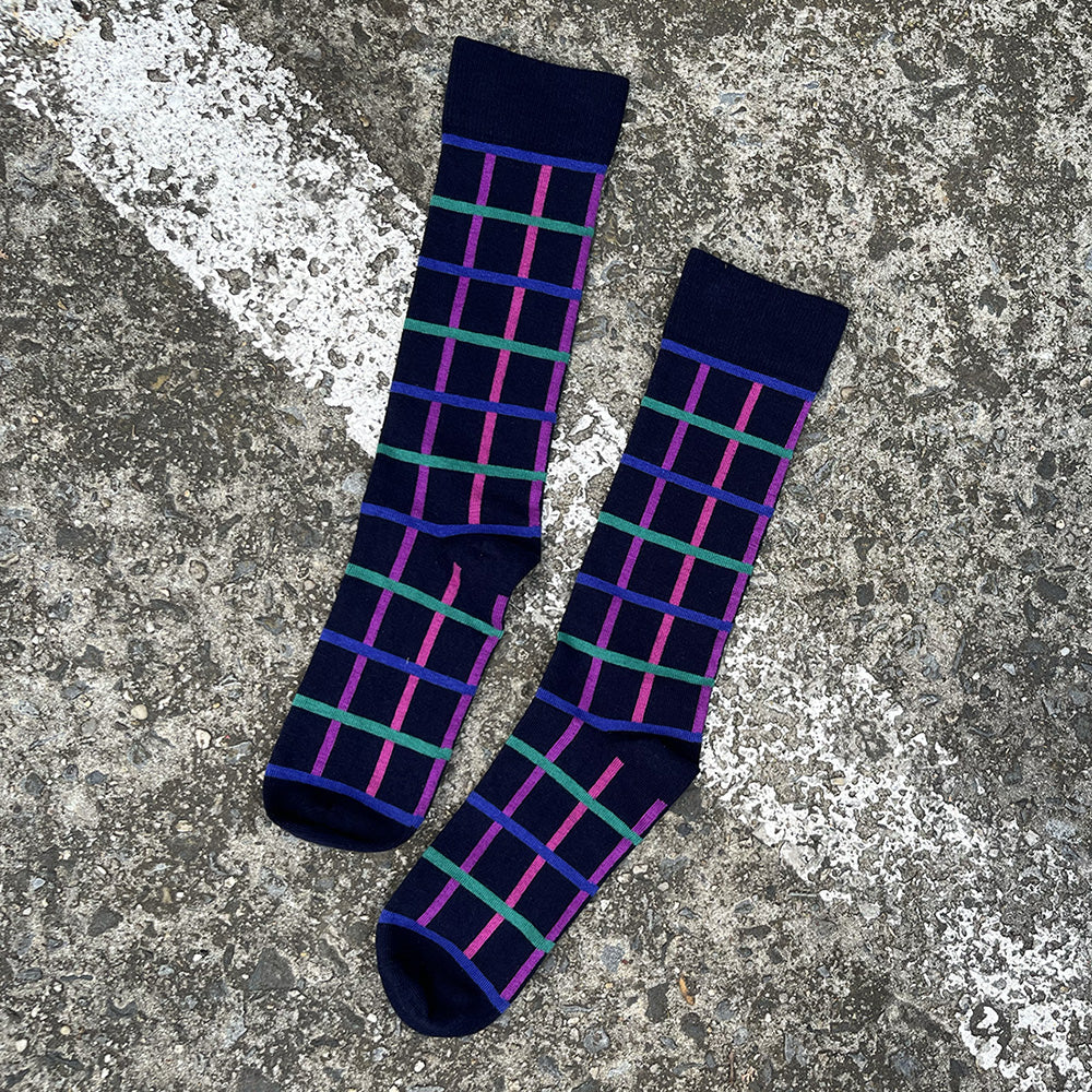 Made in USA men's navy geometric cotton socks in blues, aquas, purples, and pinks
