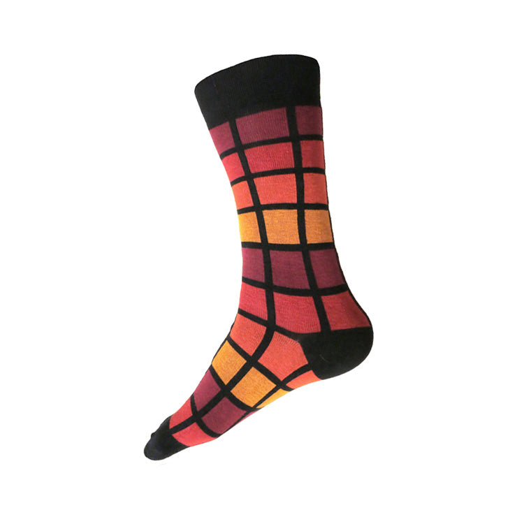 MADE IN USA men's black geometric cotton socks inspired by R62A NYC Subway car with maroon, paprika, orange, + yellow-orange pattern  Edit alt text